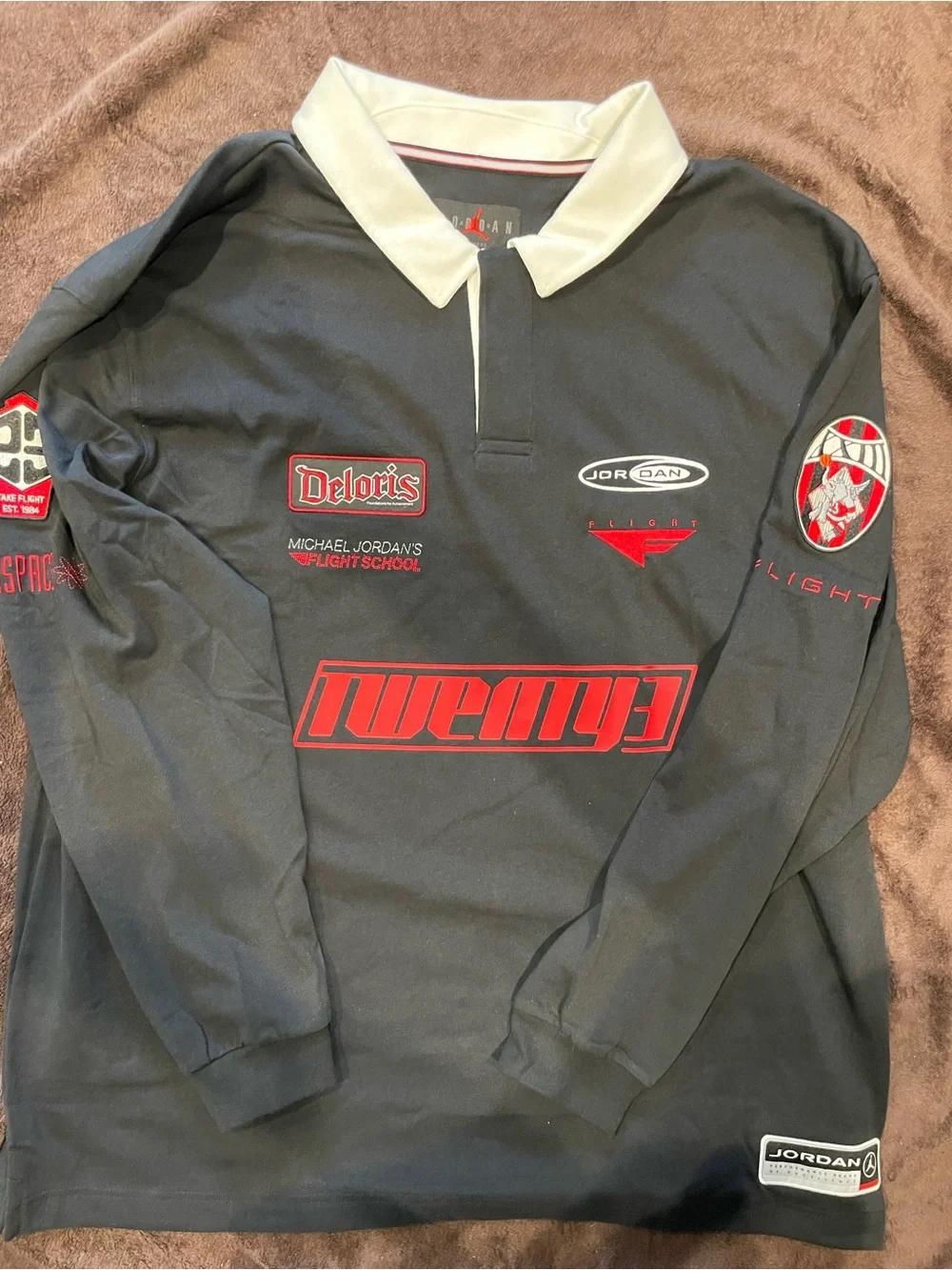 Jordan Black Long-Sleeve Rugby Polo with Red Accents and White Collar